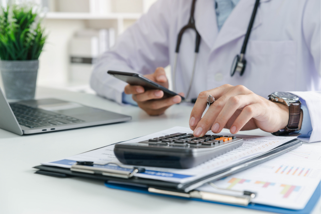 Doctor physician calculate medical healthcare fee costs